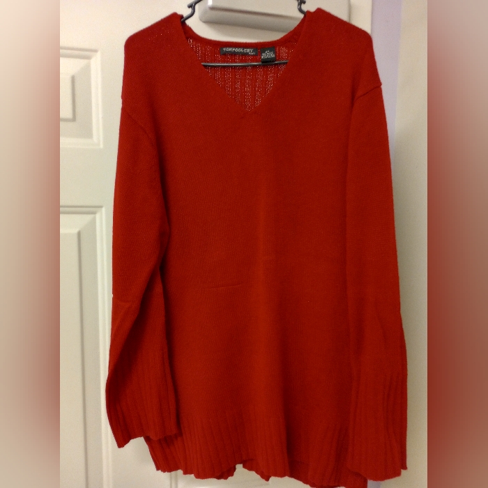 Red V-Neck Sweater With Long Sleeves And Cozy Knit Texture